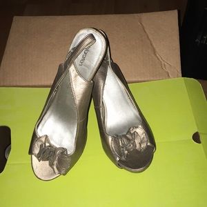 Metallic peep toe heels